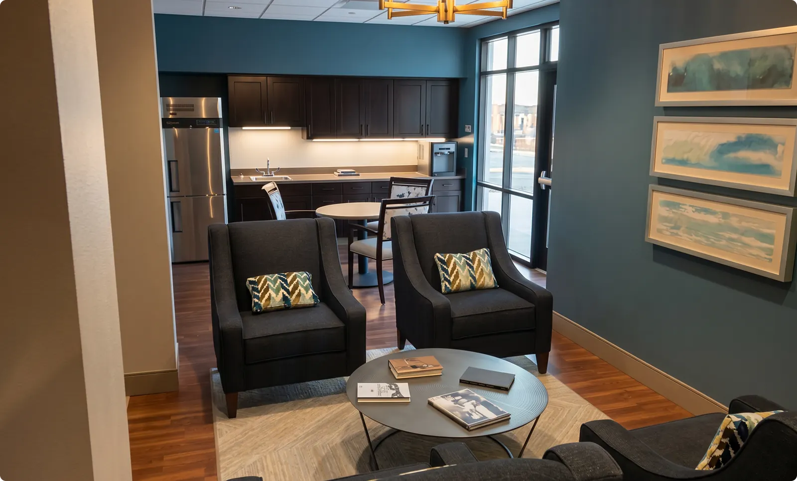 A quiet corner at Buena Vista in Chandler, with two armchairs facing each other beside a window