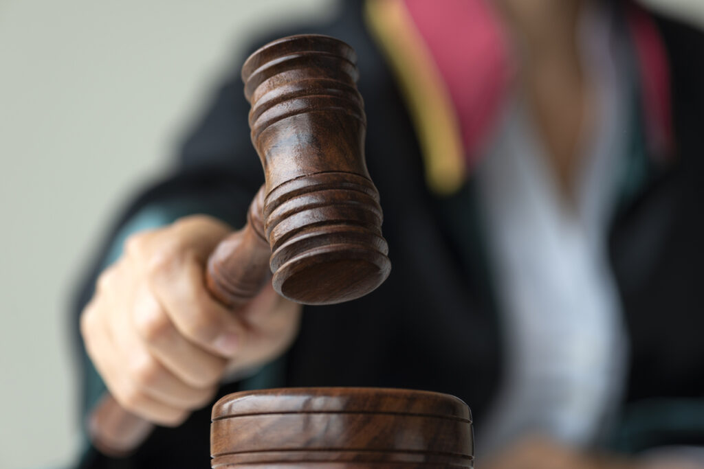 Female Judge Holding Gavel