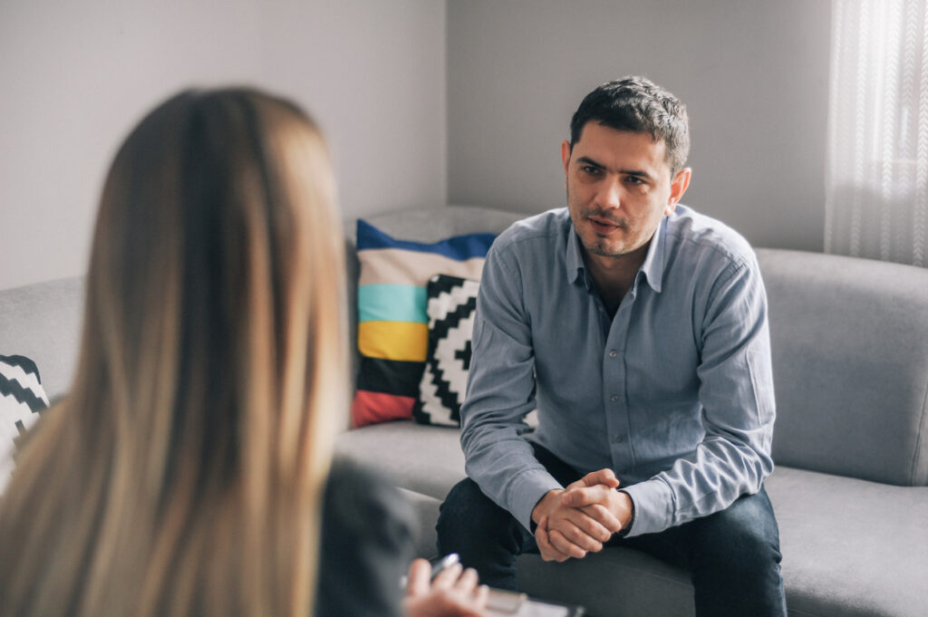 Young man on addiction therapy session